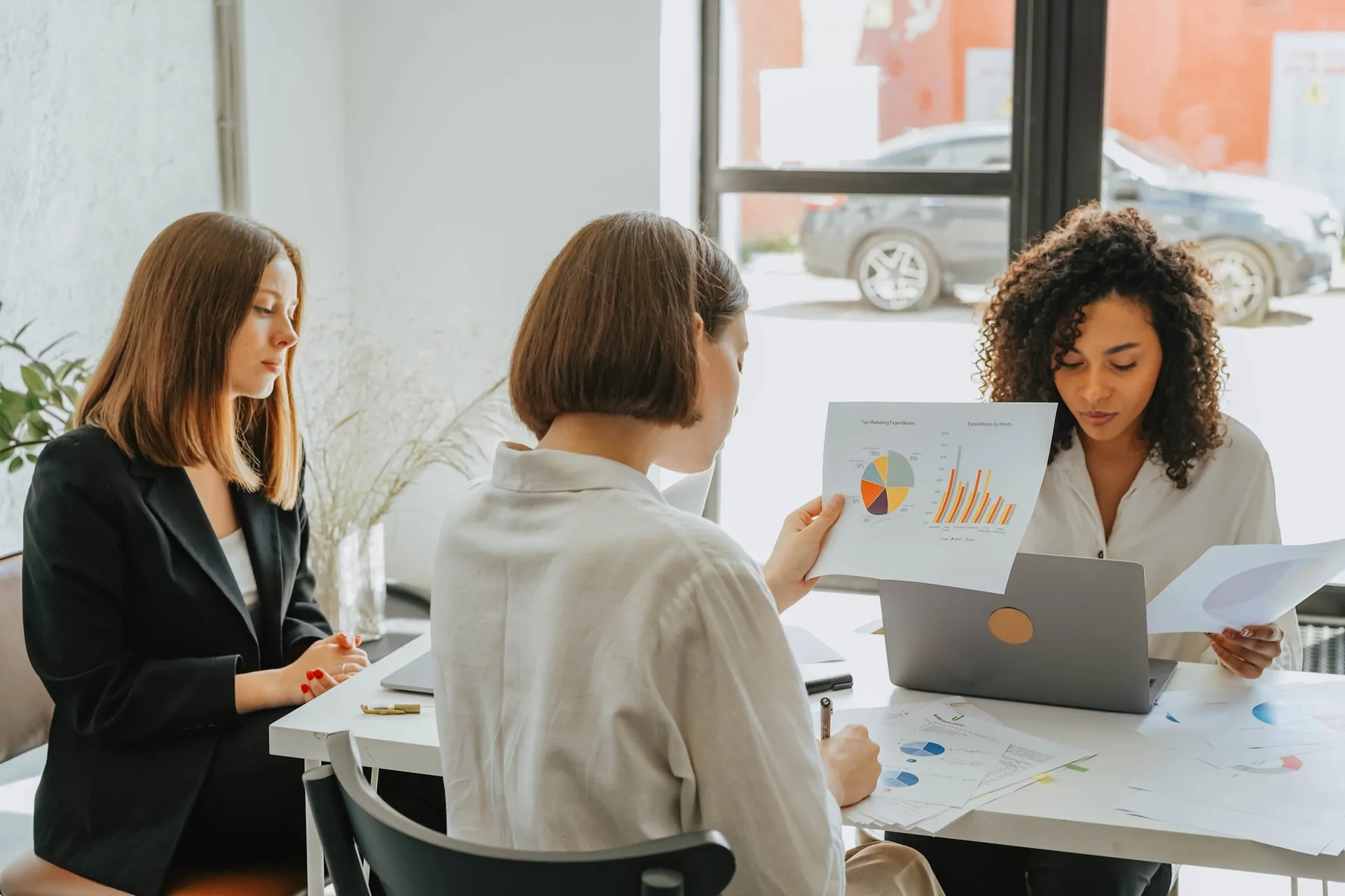 Strategist talking through a project with clients